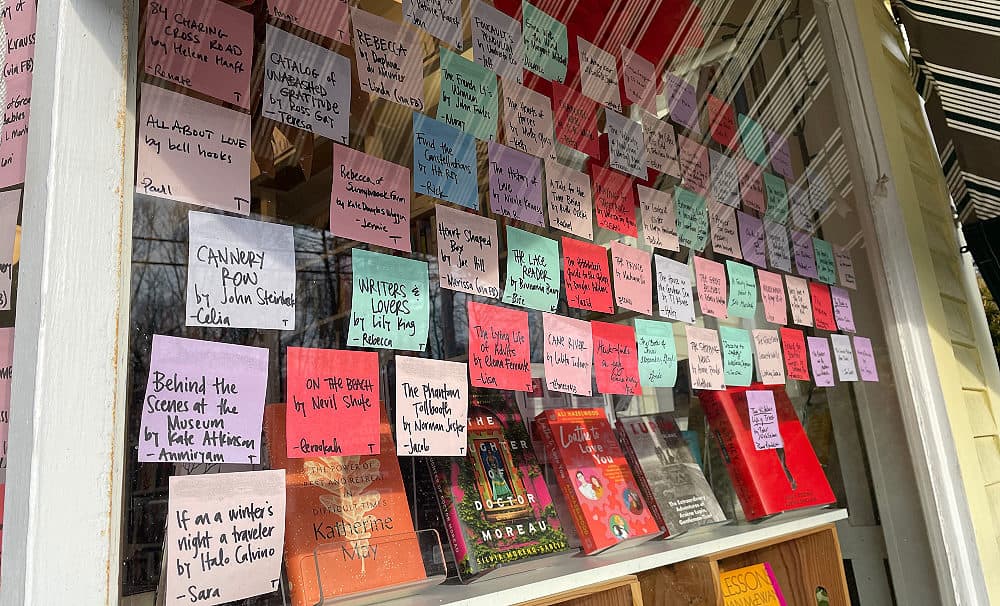 Post-it notes answering the question, “What’s a book you love with all your heart,” in the window of the author’s bookstore. Beverly, MA. 2023 (Courtesy Hannah Harlow)