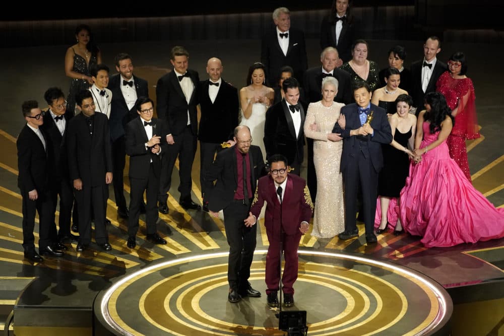 The cast and crew of &quot;Everything Everywhere All at Once&quot; accepts the award for best picture. (Chris Pizzello/AP)