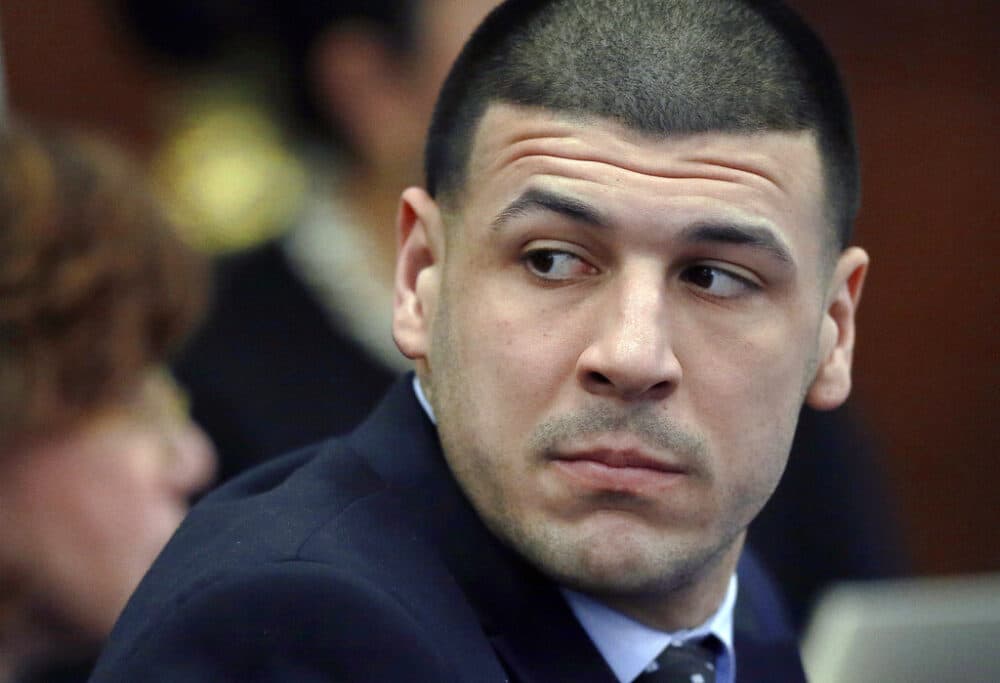 The late former NFL player Aaron Hernandez listens during his double murder trial in Suffolk Superior Court in Boston, in this March 29, 2017, file photo. (Elise Amendola, Pool/AP)