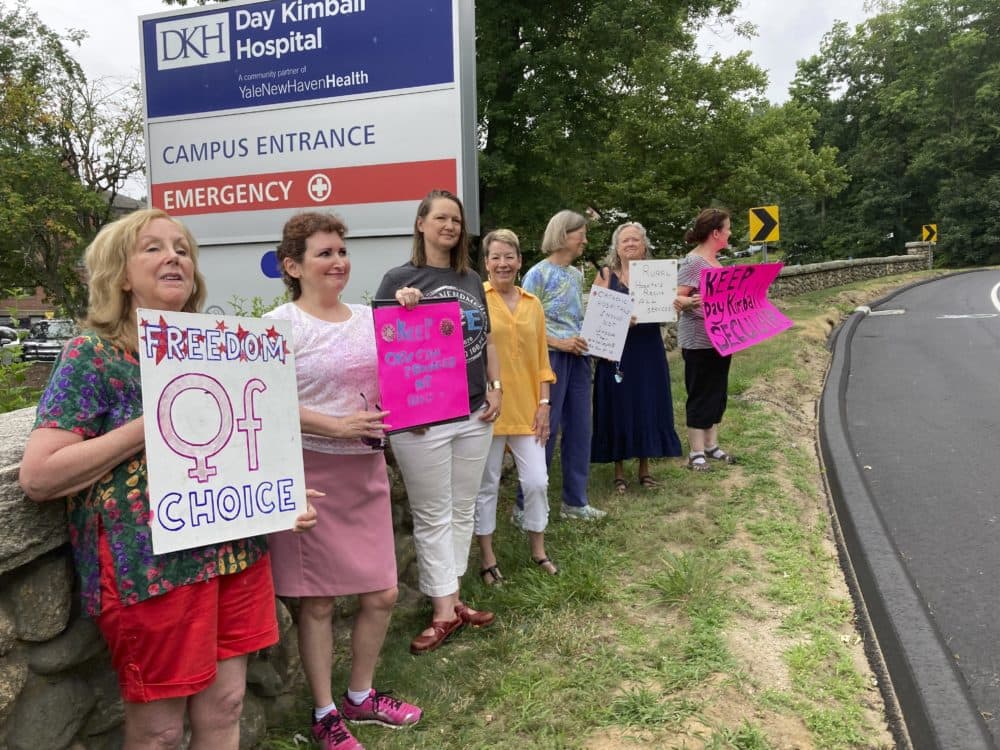 Residents from various communities in mostly rural northeastern Connecticut protest Day Kimball Healthcare's plans to affiliate with Covenant Healthcare, outside Day Kimball Hospital on July 18, 2022, in Putnam, Conn. (Susan Haigh/AP)
