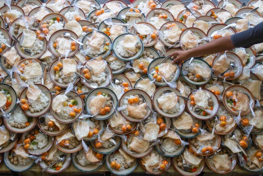 A Muslim person prepares meals for breaking fast during the Islamic holy month of Ramadan. (Devi Rahman/AFP via Getty Images)