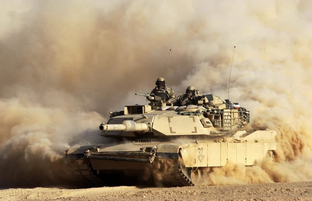 A U.S. Army 3rd Infantry Division M1/A1 Abrahms tank rolls deeper into Iraqi territory March 23, 2003 south of the city of An Najaf, Iraq. U.S. and British forces continue to assault Iraq from land, sea and air as part of the ongoing Operation Iraqi Freedom. (Scott Nelson/Getty Images)