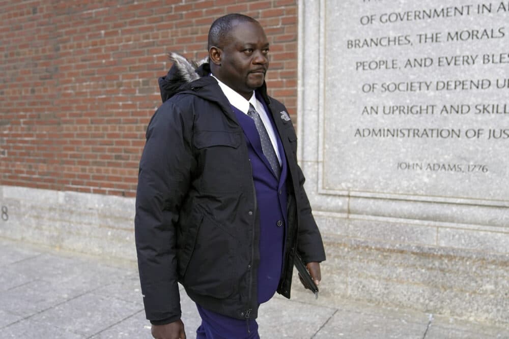 Former Haitian Mayor Jean Morose Viliena departs federal court, March 20, in Boston. (Steven Senne/AP)