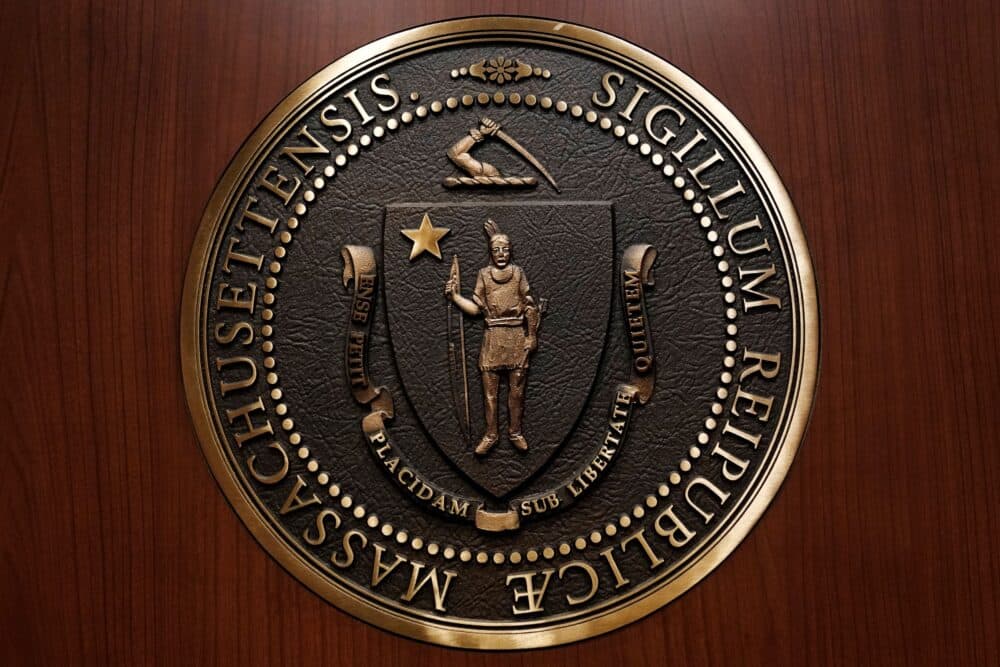 The seal of the Commonwealth of Massachusetts, featuring a Native American at center, is displayed on a medallion inside an elevator at the Statehouse, March 3, in Boston. (Charles Krupa/AP)