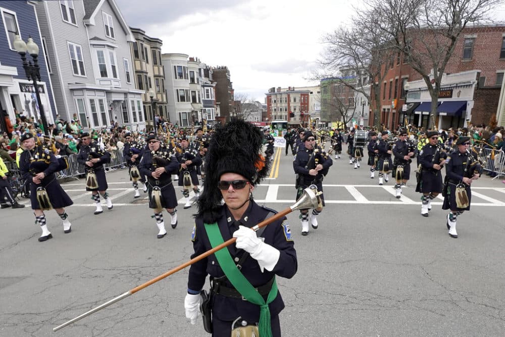 Members of the Boston Police Gaelic Column of Pipes and Drums march during the St. Patrick's Day parade, Sunday, March 20, 2022, in Boston's South Boston neighborhood. (Steven Senne/AP)
