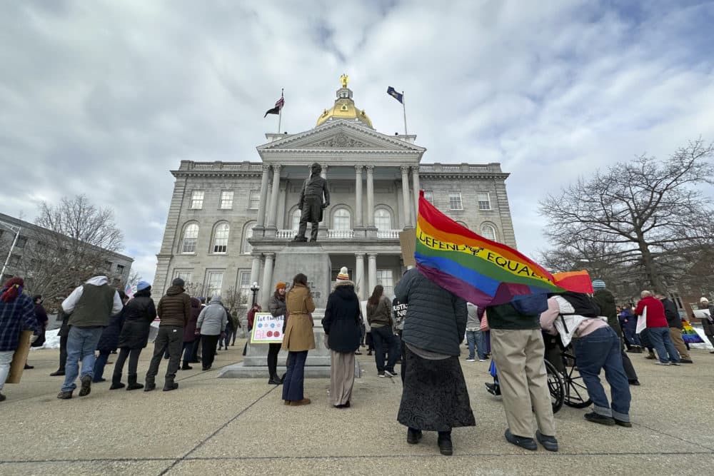Advocates for transgender youth rally outside the New Hampshire Statehouse, in Concord, N.H., March 7. (Holly Ramer/AP)