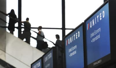 Two United Airlines flights scheduled to depart from Boston's Logan International Airport on Monday made contact with each other near the gate area, federal aviation and airport officials said. (Lisa Poole/AP)