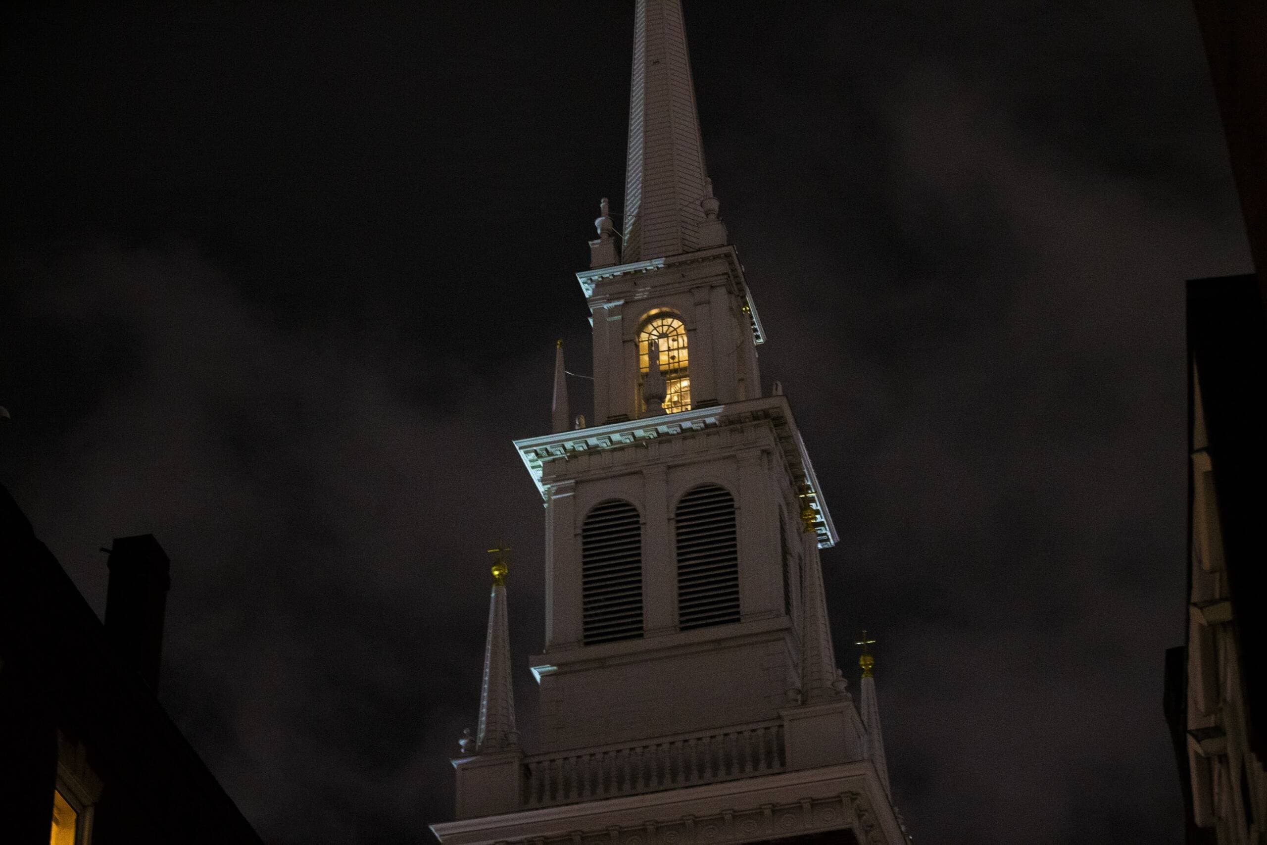 The lanterns are lit in the Old North Church on Jan. 5, 2022. (Jesse Costa/WBUR)