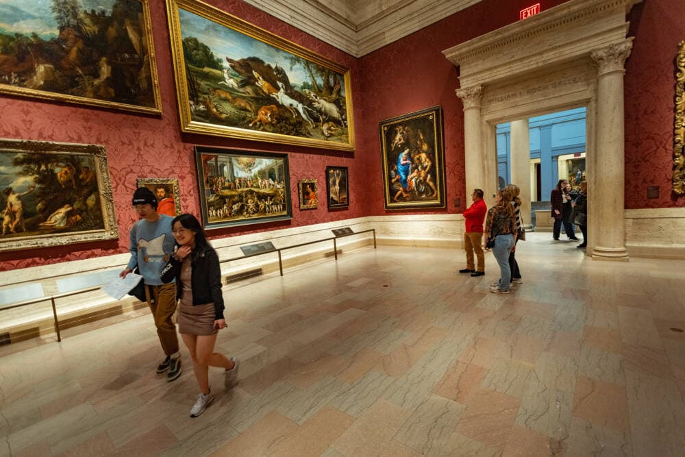 Visitors walking through a gallery at the Museum of Fine Arts, Boston. (Jesse Costa/WBUR)