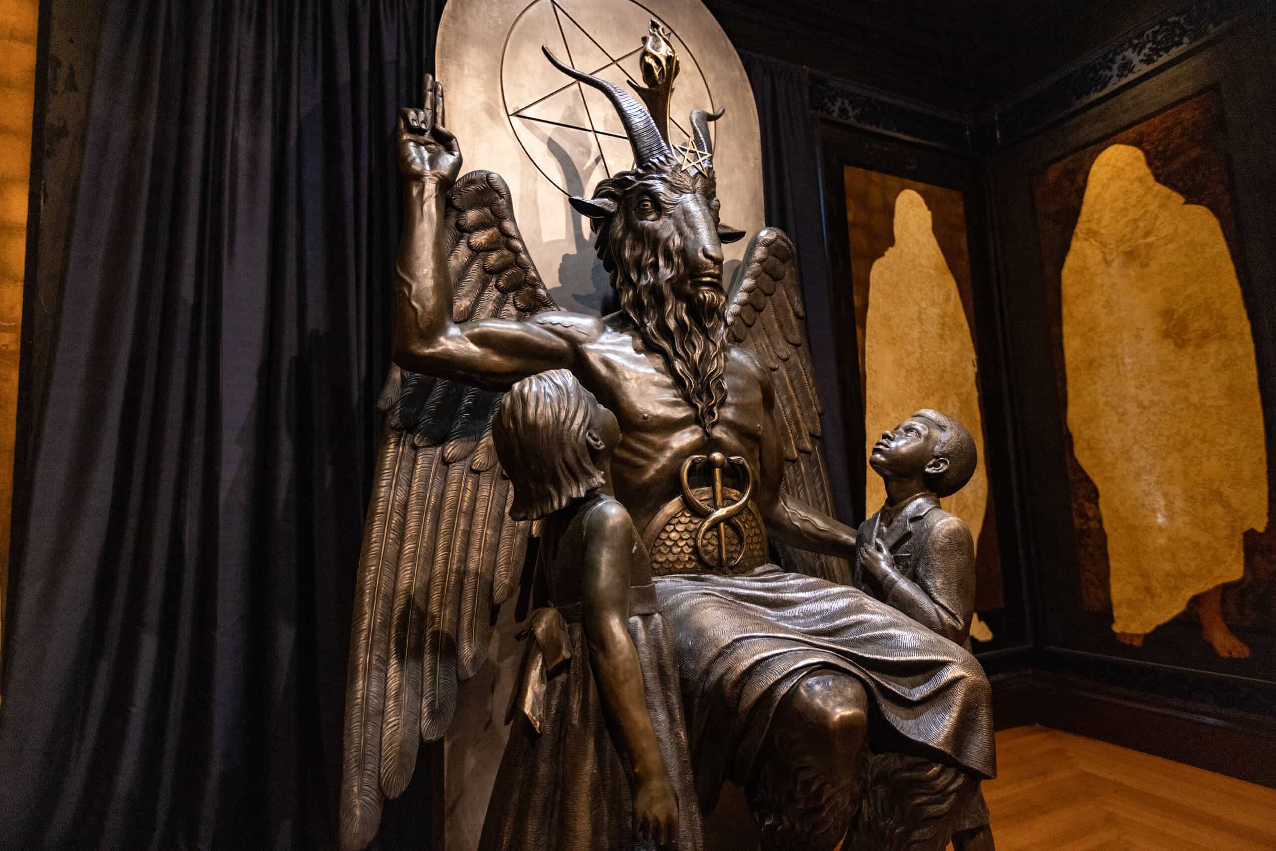 A statue of Baphomet, a winged-goat creature that has long been associated with Satanism, at the Satanic Temple in Salem. (Jesse Costa/WBUR)