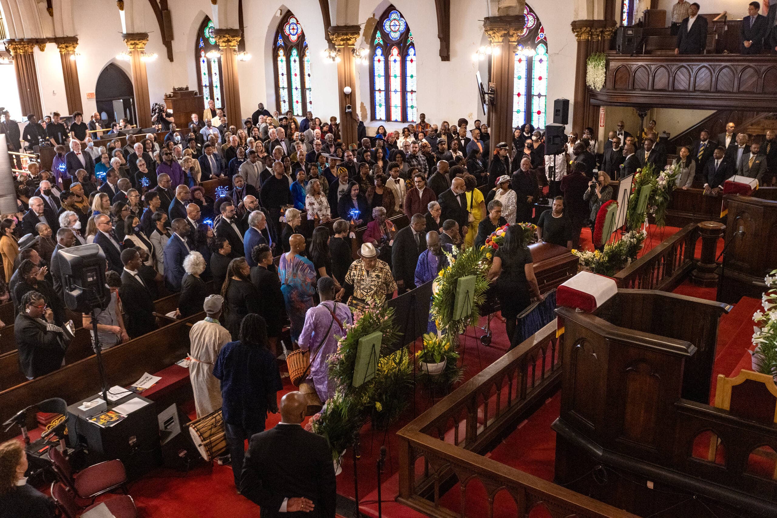 Pallbearers place the casket of Mel King at the front of the church for the funeral service at Union United Methodist Church in the South End. (Jesse Costa/WBUR)