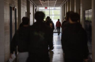 Students walk between classes Chelsea High School. (Robin Lubbock/WBUR)