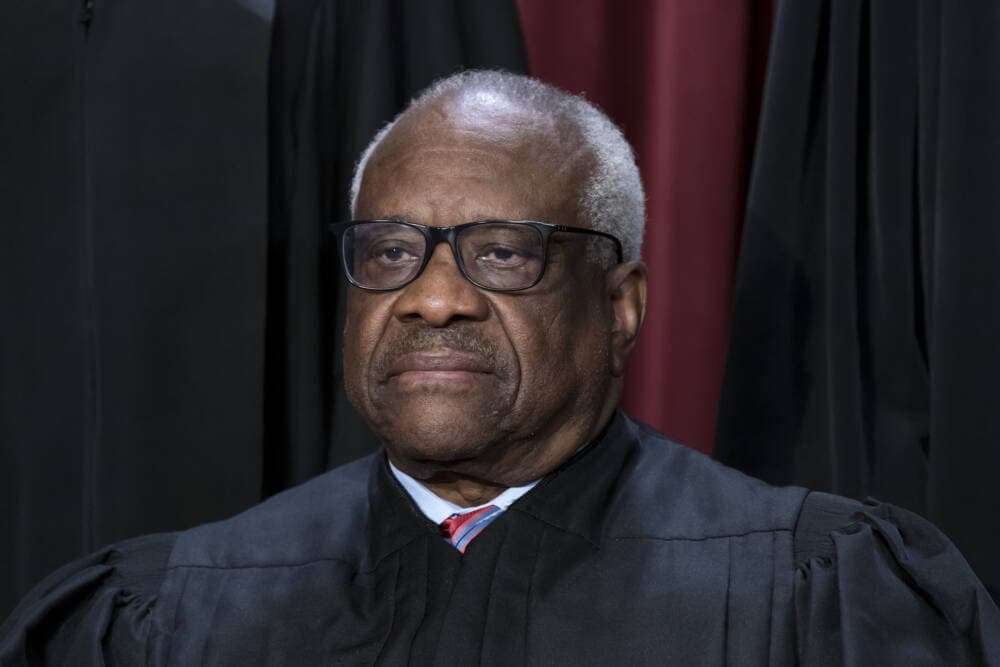 Associate Justice Clarence Thomas poses for a new group portrait at the Supreme Court building in Washington. (J. Scott Applewhite/AP)