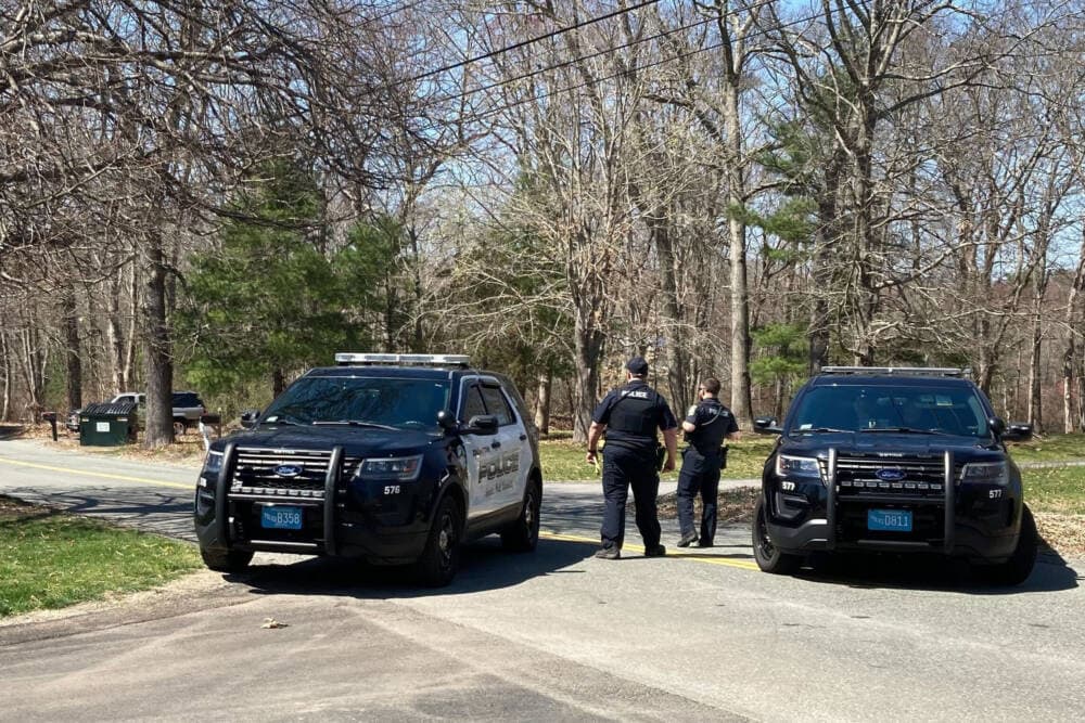 Police block a road in North Dighton, Mass., Thursday, April 13, 2023, as the FBI sought to question guardsman Jack Teixeira for the alleged leak of intelligence documents. (Michelle R. Smith/AP)