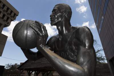 A statue to Boston Celtics basketball great Bill Russell is seen on City Hall Plaza on Aug. 1, 2022, in Boston. Bill Russell never had to find his voice as an activist. He didn't know any other way but to speak his mind. Russell died at age 88. (Michael Dwyer/AP)