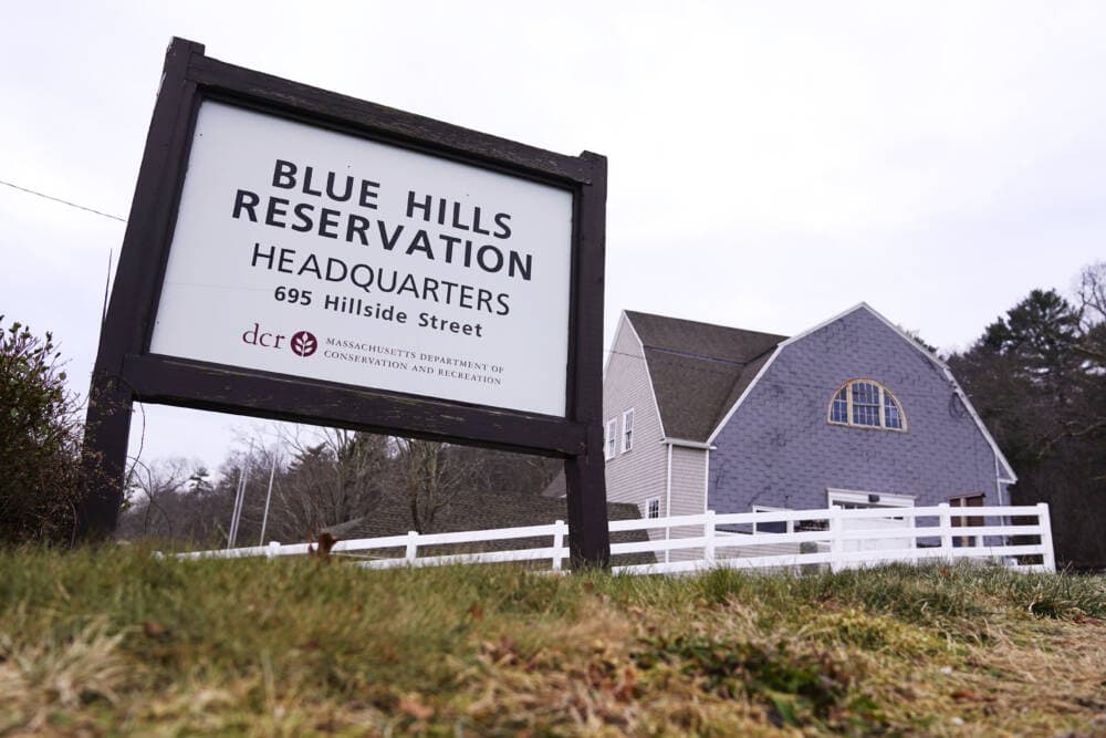 A sign marks a trailhead and headquarters at the Blue Hills Reservation in Milton. (Charles Krupa/AP Photo)