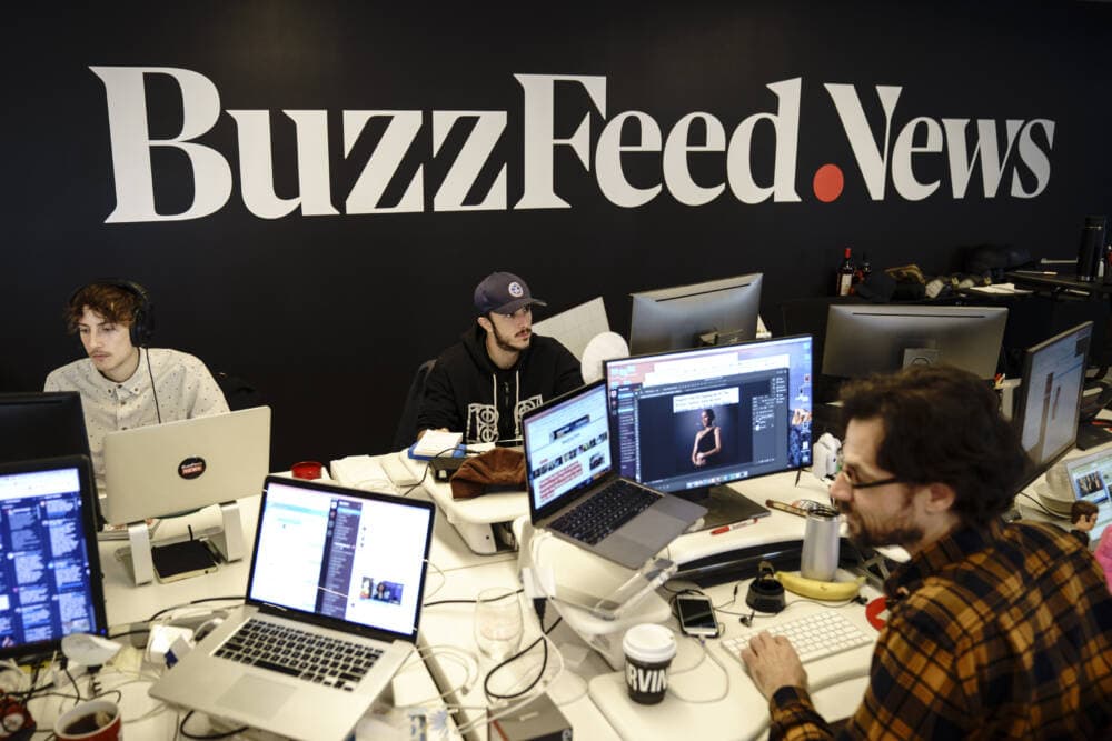 Members of the BuzzFeed News team work at their desks at BuzzFeed headquarters, Dec. 11, 2018 in New York City. (Drew Angerer/Getty Images)