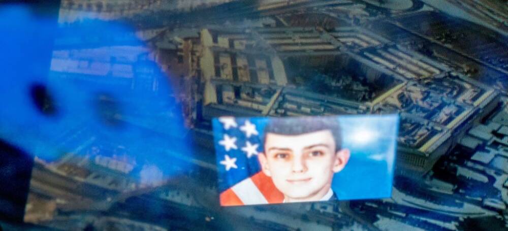 TOPSHOT - This photo illustration created on April 13, 2023, shows the Discord logo and the suspect, national guardsman Jack Teixeira, reflected in an image of the Pentagon in Washington, DC. - FBI agents on Thursday arrested a young national guardsman suspected of being behind a major leak of sensitive US government secrets -- including about the Ukraine war. US Attorney General Merrick Garland announced the arrest made &quot;in connection with an investigation into alleged unauthorized removal, retention and transmission of classified national defense information.&quot; (Photo by Stefani REYNOLDS / AFP) (Photo by STEFANI REYNOLDS/AFP via Getty Images)