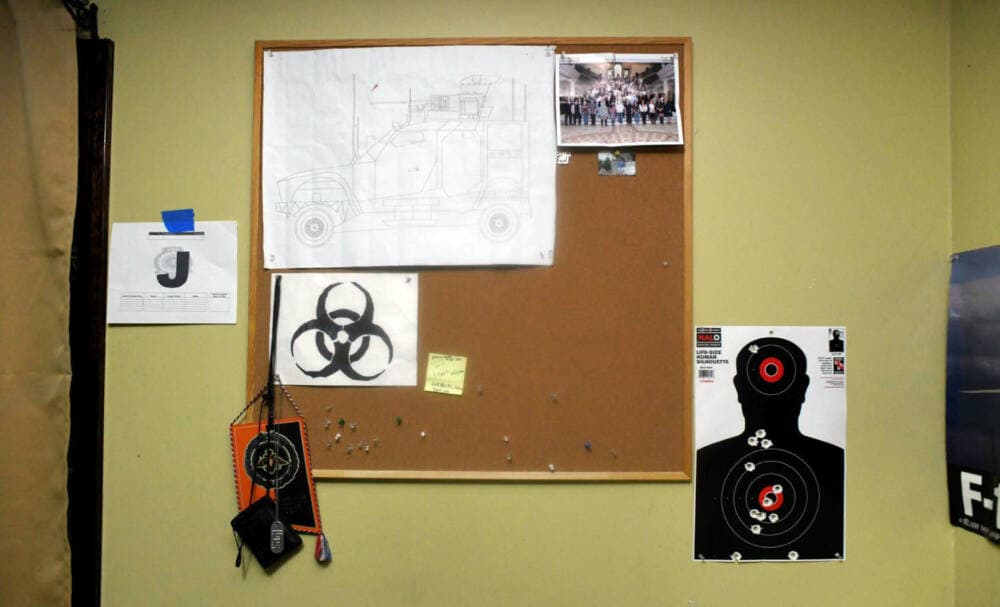 This image contained in a Justice Department motion for continued pretrial detention of Jack Teixeira, shows his room at his father's home in North Dighton, Mass. Prosecutors said Teixeira kept an arsenal of weapons and said on social media that he would like to kill a &quot;ton of people.&quot; (Justice Department via AP)