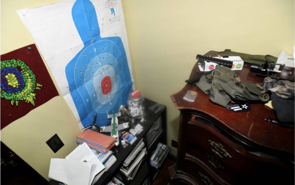 Prosecutors released this photo of Jack Teixeira's room after it was searched by investigators. Ammunition sat on the dresser (U.S. Attorney's office)