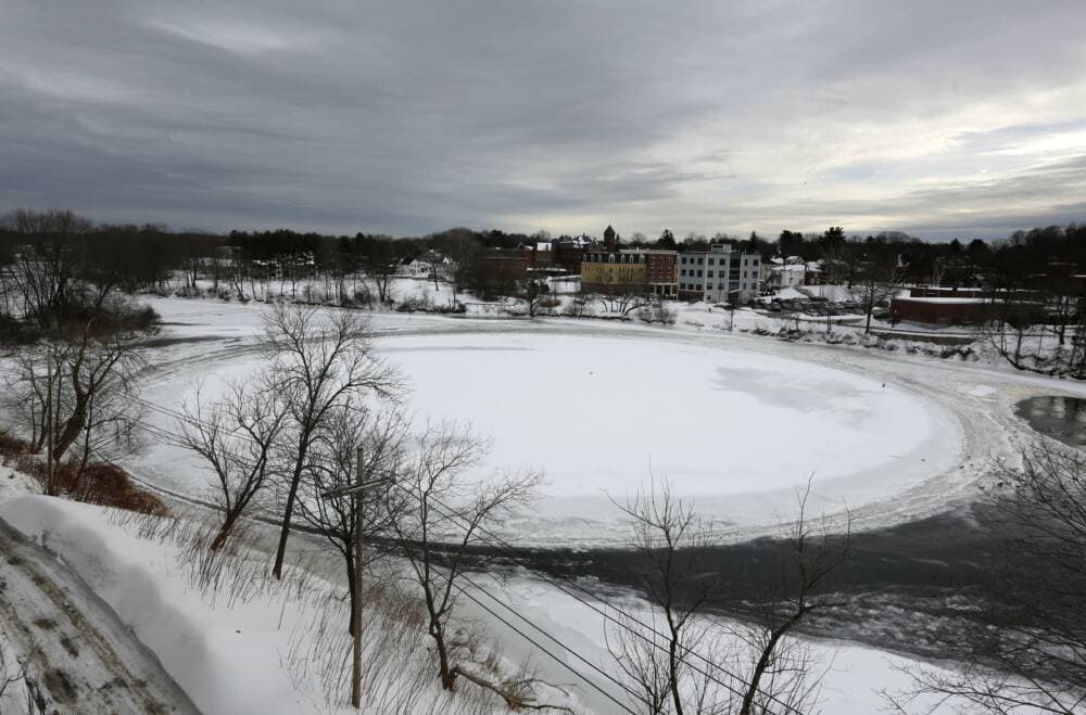 In this Jan. 23, 2019 file photo, a naturally occurring, slowly spinning ice disk the width of a football field floats in the Presumpscot River in Westbrook, Maine. (Robert F. Bukaty/AP)