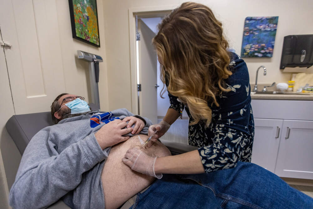 Dr. Stephanie Stratigos administered a dose of Sublocade to Joey Kinghorn at the substance use disorder treatment clinic she ran at Emerson Hospital. Emerson shut down the program June 2. (Jesse Costa/WBUR)