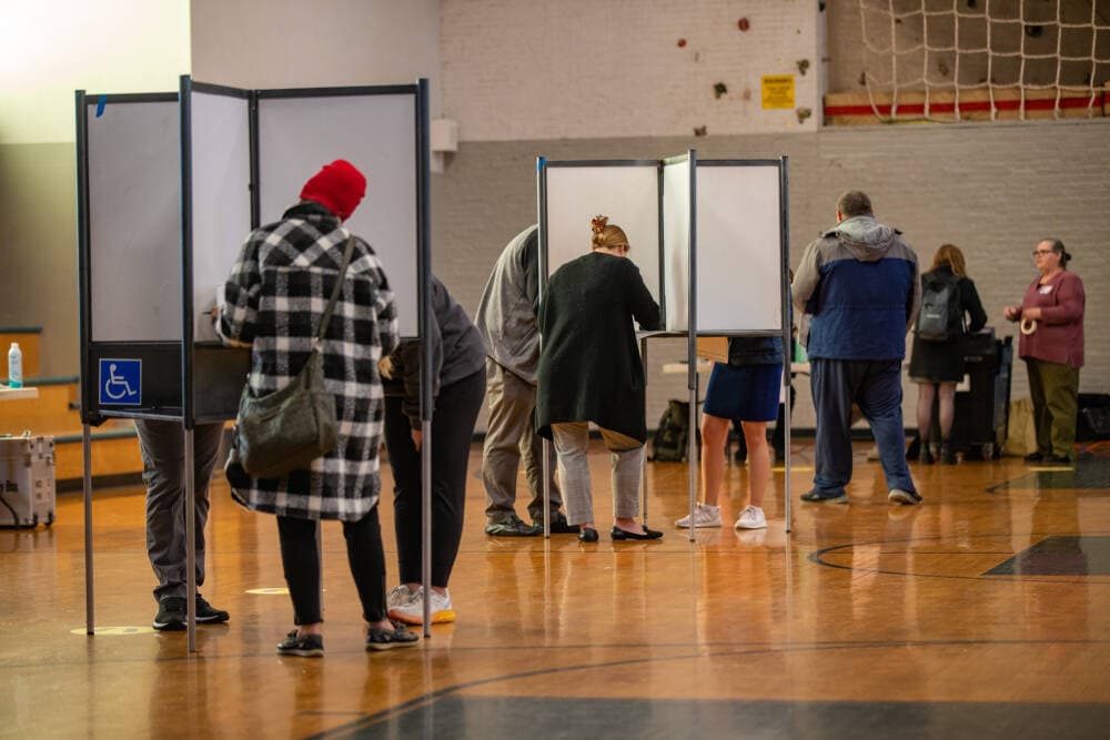 Voters fill out their ballots at the Boys and Girls Club. (Jesse Costa/WBUR)