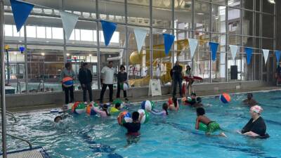 Kids learn to swim at a recent Swim Seattle event. (Courtesy of Seattle Parks and Recreation)
