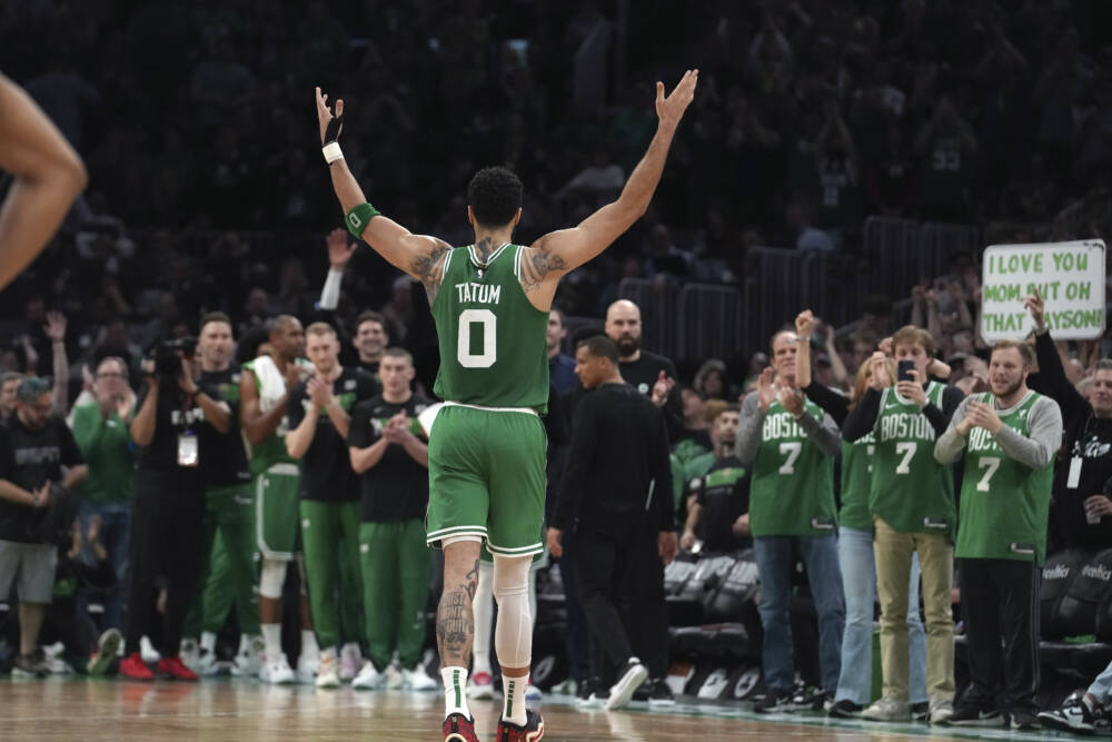 Boston Celtics forward Jayson Tatum (0) receives applause as he steps off the court near the end of Game 7 against the Philadelphia 76ers in the NBA basketball Eastern Conference semifinal playoff series, Sunday, May 14, 2023, in Boston. (Steven Senne/AP)