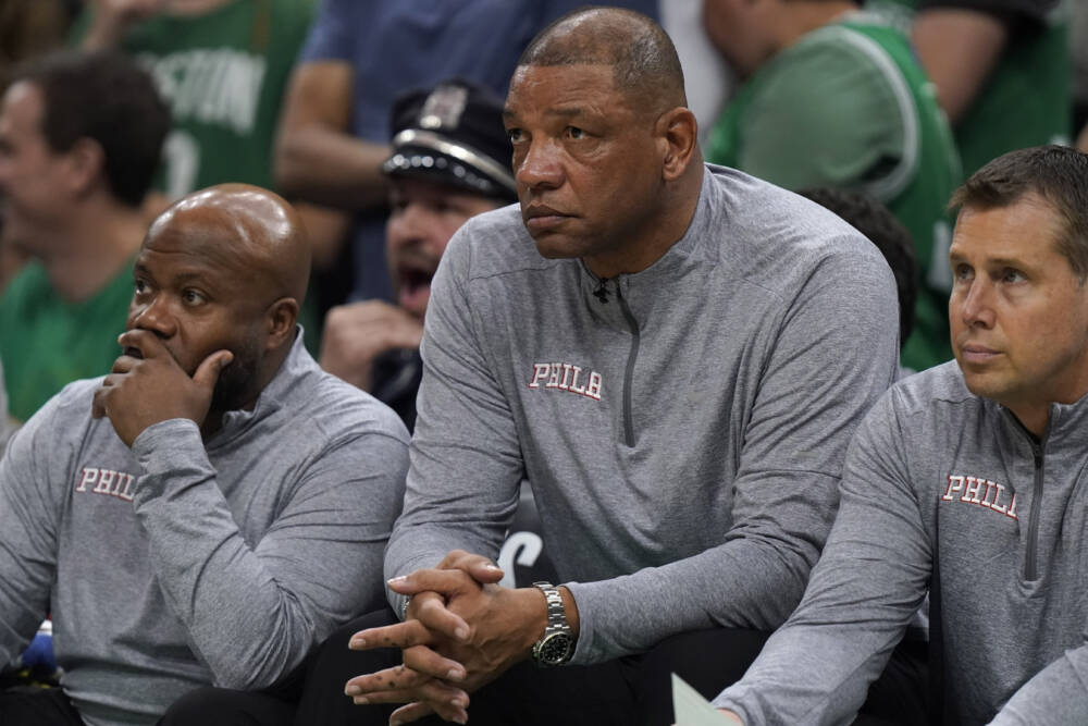 Philadelphia 76ers head coach Doc Rivers, center, watches from the bench as the 76ers trail the Boston Celtics during the second half of Game 7 in the NBA basketball Eastern Conference semifinal playoff series, Sunday, May 14, 2023, in Boston. (Steven Senne/AP)