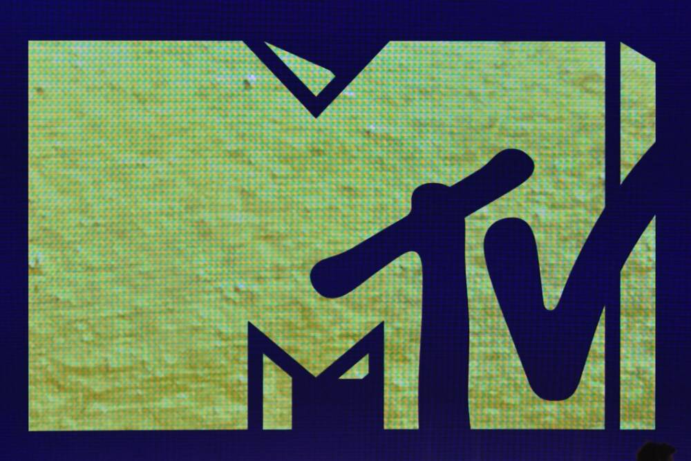 The MTV logo is shown on a screen. (Valerie Macon/AFP via Getty Images)