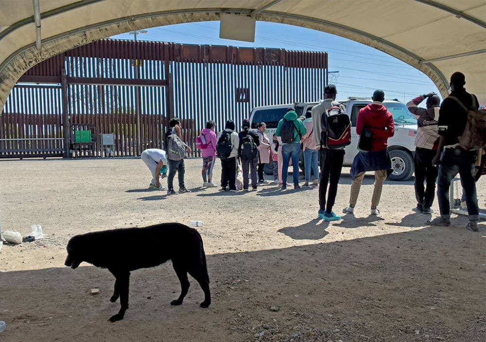 Migrants attempting to cross in to the U.S. from Mexico are detained by U.S. Customs and Border Protection at the border May 05, 2023 in San Luis, Arizona. (Nick Ut/Getty Images)