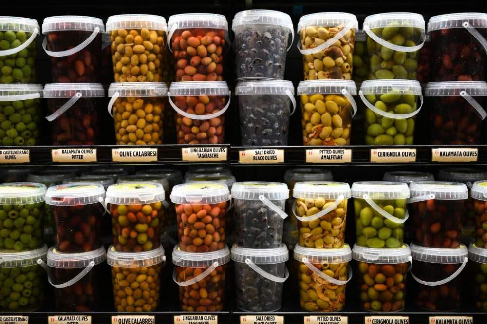  A variety of olives in plastic containers on a shelf at Uncle Giuseppe's grocery store in North Babylon, New York on December 29, 2020.  (Steve Pfost/Newsday via Getty Images)