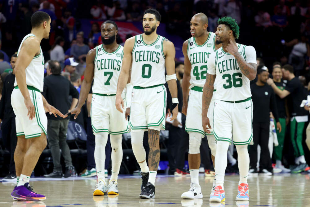 Malcolm Brogdon #13, Jaylen Brown #7, Jayson Tatum #0, Al Horford #42 and Marcus Smart #36 of the Boston Celtics talk against the Philadelphia 76ers during the fourth quarter in game six of the Eastern Conference Semifinals in the 2023 NBA Playoffs at Wells Fargo Center on May 11, 2023 in Philadelphia, Pennsylvania. (Tim Nwachukwu/Getty Images)