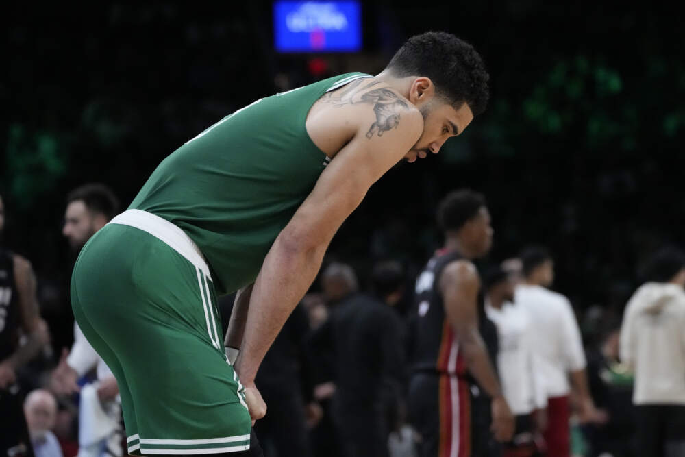 Boston Celtics forward Jayson Tatum rests during a timeout during the second half in Game 7 of the NBA basketball Eastern Conference finals against the Miami Heat Monday, May 29, 2023, in Boston. (Charles Krupa/AP)