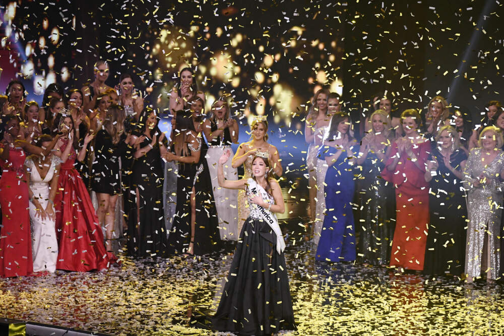 Miss Alaska Emma Broyles waves in confetti after being crowned Miss America, Thursday, Dec. 16, 2021, at Mohegan Sun in Uncasville, Conn. (Jessica Hill/AP)