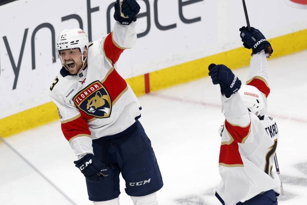 Florida Panthers' Sam Reinhart (13) and Matthew Tkachuk celebrate after the tying goal by Brandon Montour during the third period of Game 7 of an NHL hockey Stanley Cup first-round playoff series against the Boston Bruins, April 30, 2023, in Boston. (Michael Dwyer/AP)