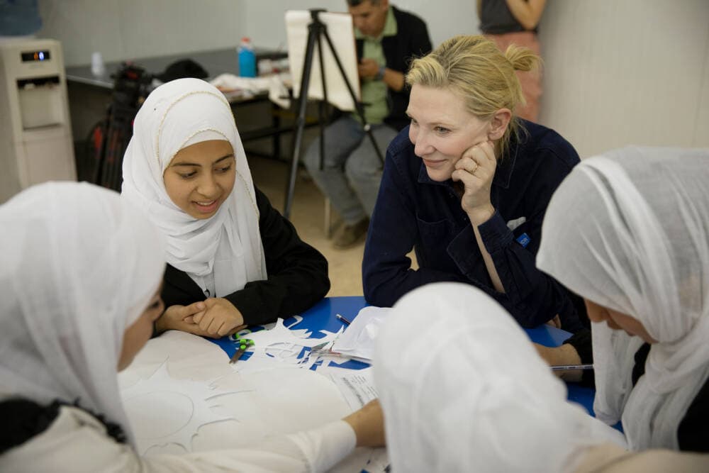 UNHCR goodwill ambassador Cate Blanchett visits a TIGER workshop in the community centre in District 2 of Zaatari refugee camp, Jordan. TIGER, &quot;These inspired girls enjoy reading,&quot; is a group of adolescent girls who gather for extracurricular education, including life skills sessions, Arabic, English, and Information & Communication Technology, a reading club, and sessions to discuss adolescents’ issues. (Caroline Irby for UNHCR)