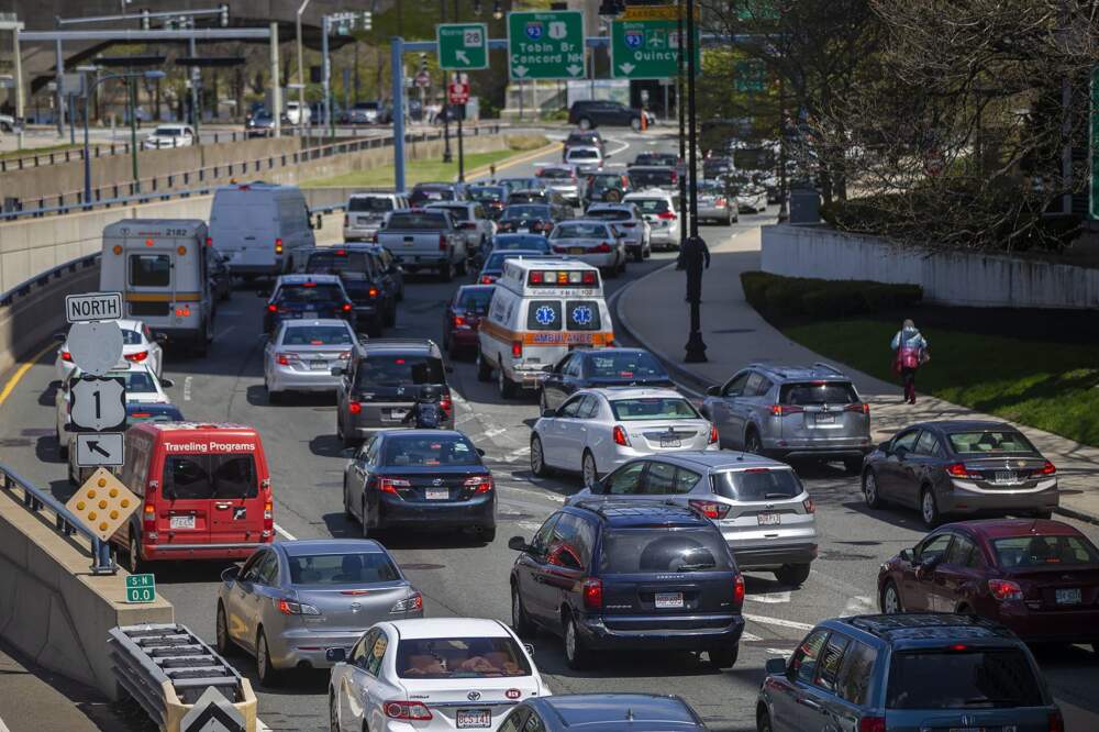 An ambulance caught in midday traffic on Storrow Drive on May 6, 2019. (Jesse Costa/WBUR)
