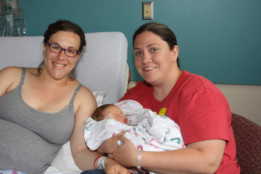 Naomi Goldberg, her wife Libby Hemphill and their newborn son in 2013. (Courtesy of Naomi Goldberg)