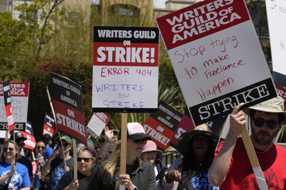 Members of the Writers Guild of America picket outside CBS Television City. (Damian Dovarganes/AP)