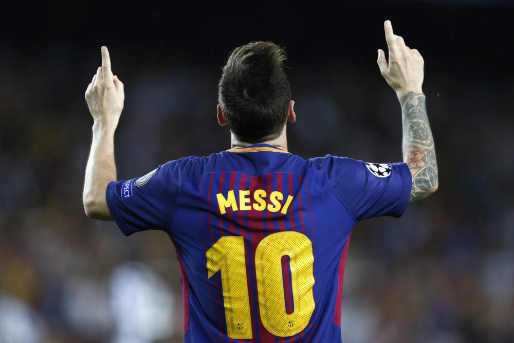 Lionel Messi celebrates after scoring a goal. (Francisco Seco/AP)