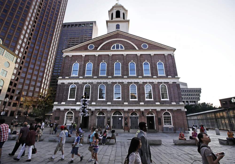 Faneuil Hall is now home to an exhibit detailing the history of slavery in Boston. The building itself is named for a man who owned and traded slaves. (Charles Krupa/AP)