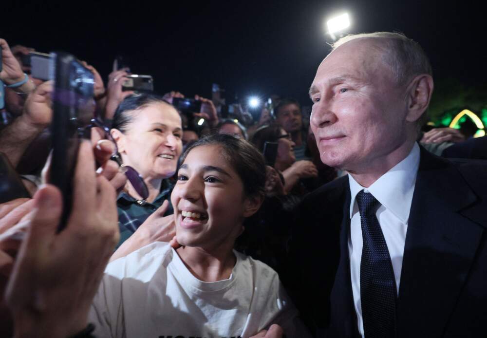 Russian President Vladimir Putin meets with residents of Derbent during his working trip to Russia's Republic of Dagestan on June 28, 2023. (Gavriil Grigorov/Sputnik/AFP via Getty Images)