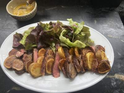Steak and potato salad with shallot-mustard vinaigrette. (Kathy Gunst/Here & Now)