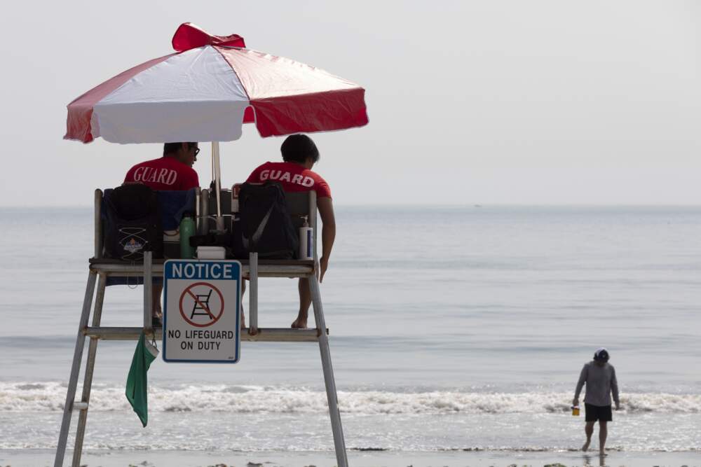 Lifeguards watch over Revere Beach. (Michael Dwyer/AP)