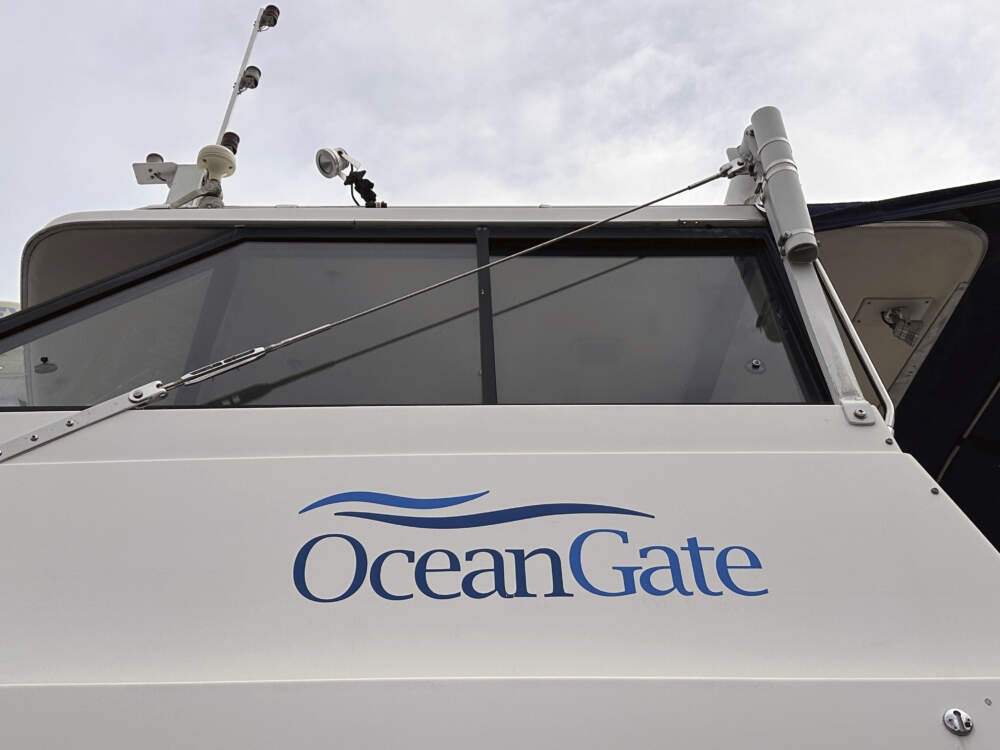 The logo for OceanGate Expeditions is seen on a boat parked near the offices of the company at a marine industrial warehouse office door in Everett, Wash., Tuesday, June 20, 2023. (Ed Komenda/AP)