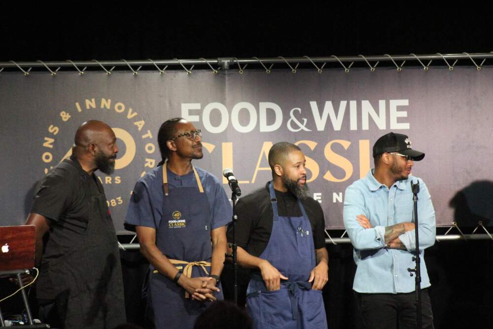 Chefs Erick Williams, Gregory Gourdet, Damarr Brown and Kwame Onwuachi at a pop-up dinner on June 17. The event celebrated the award-winning chefs during the Food and Wine Classic in Aspen. (Kaya Williams/Aspen Public Radio)