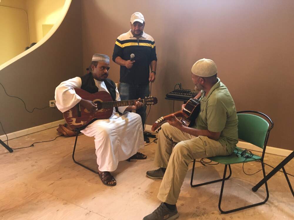 Traditional musicians set up to play at the new Sudanese-American community center in Hayward, California. (Katherine Monahan/KQED)