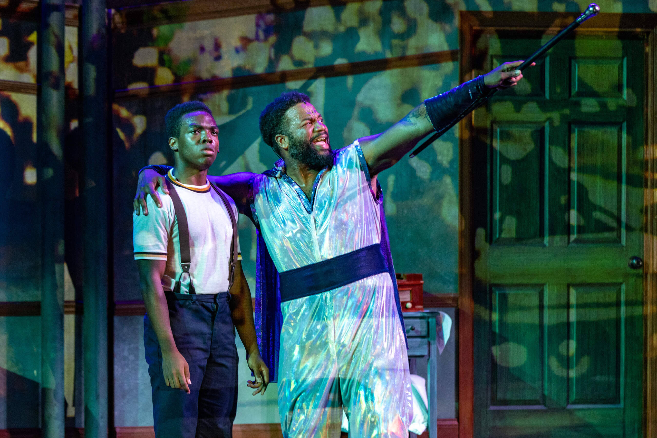 Errol Service Jr., as The Boy, and Martinez Napoleon, as J. Sonic, perform during a dress rehearsal of “The Boy Who Kissed the Sky” at the Strand Theatre. (Jesse Costa/WBUR)